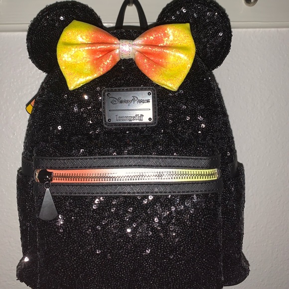 Disney Handbags - NWT Disney Loungefly Backpack Sequins Candy Corn